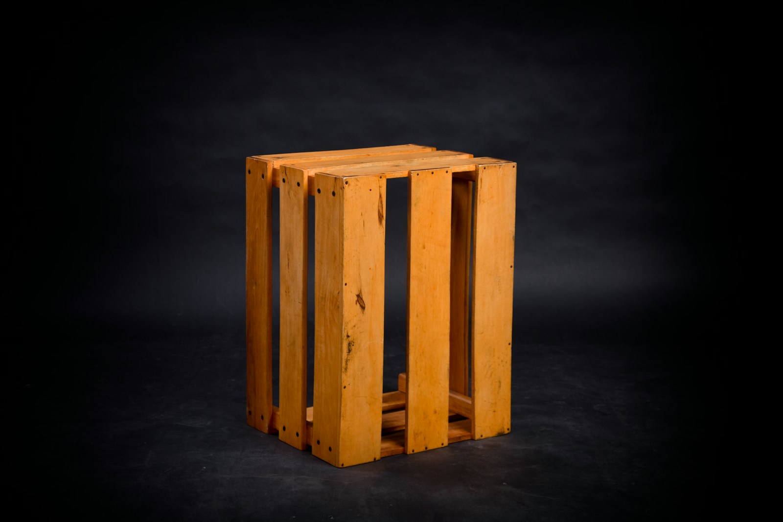 brown wooden crate with black background